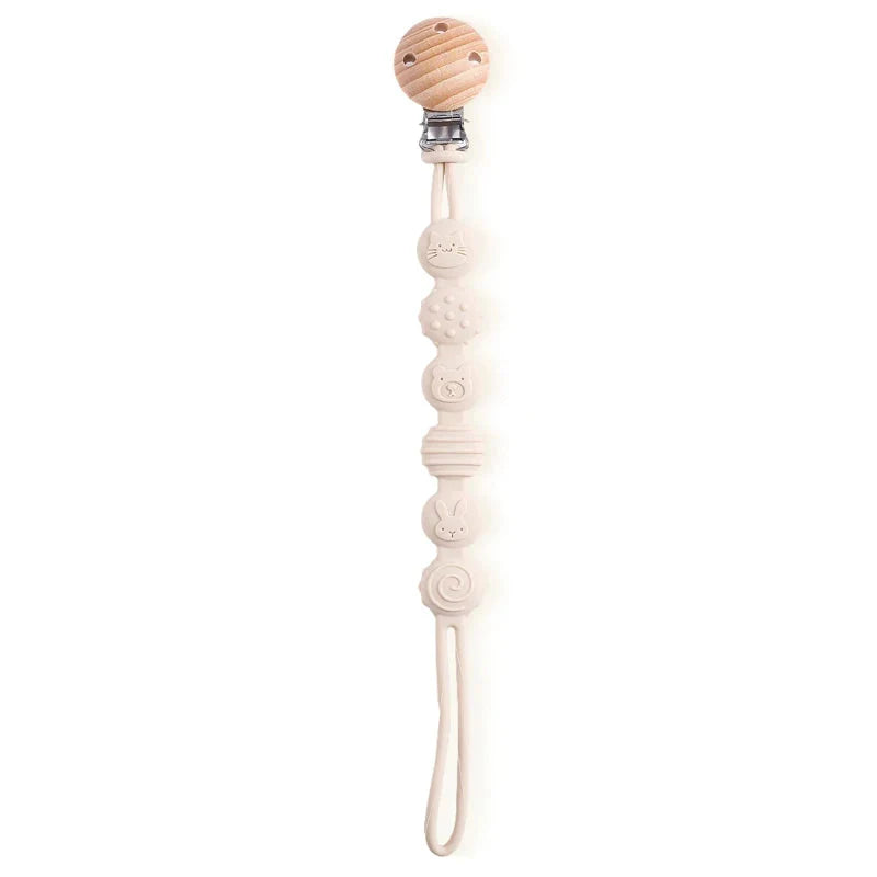 Perles en silicone colorées sur l'attache sucette pour bébé