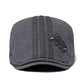 Gros plan sur un béret gris avec texture fine