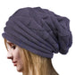 Bonnet en maille torsadée avec motif géométrique