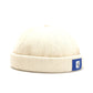 Détail du tissu velours côtelé bleu, bonnet rétro