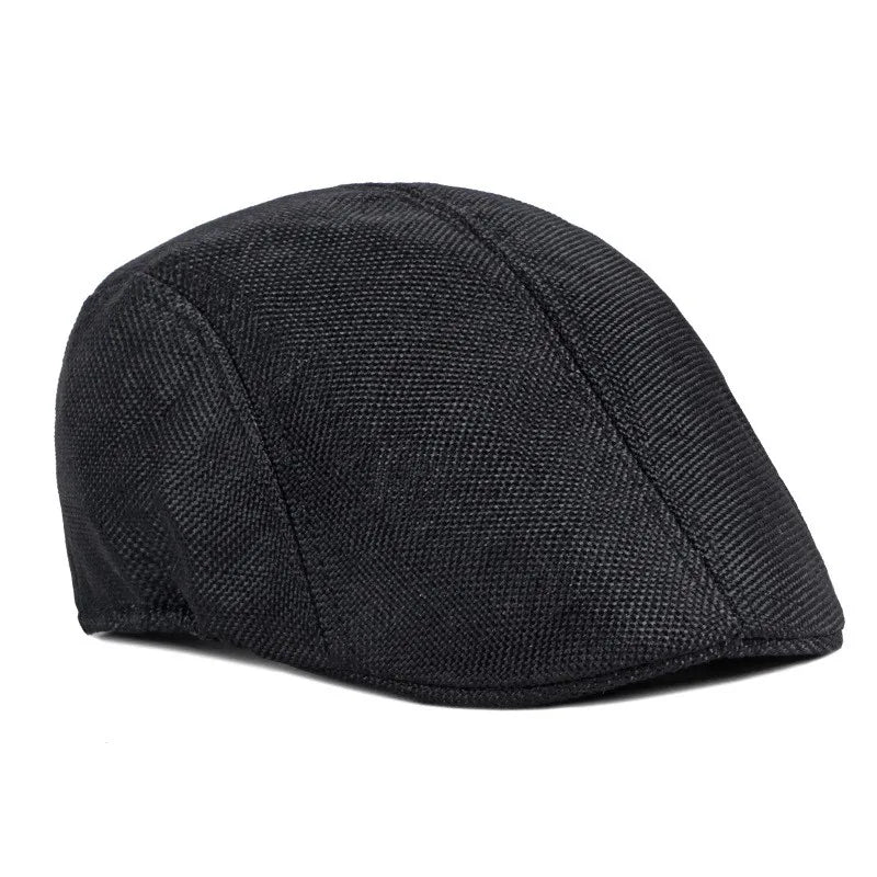 Homme assis portant un béret, regard pensif