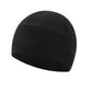Homme souriant portant un bonnet lors d'une promenade