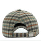 Gros plan sur le motif vintage de la casquette écossaise