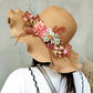 Détail du tressage du chapeau de paille