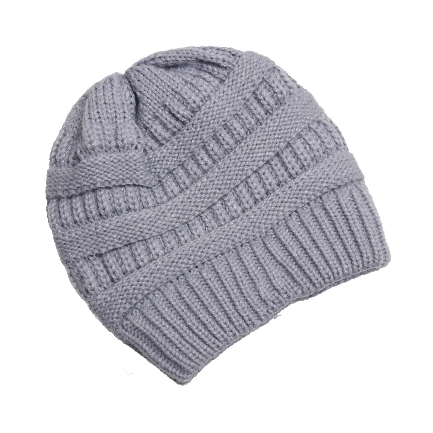Bonnet torsadé plié sur une étagère