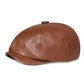 Casquette Gavroche posée sur une table en marbre