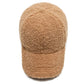 Vue latérale d'une casquette en polaire beige montrant les coutures