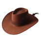 Chapeau cowboy posé sur une botte en cuir