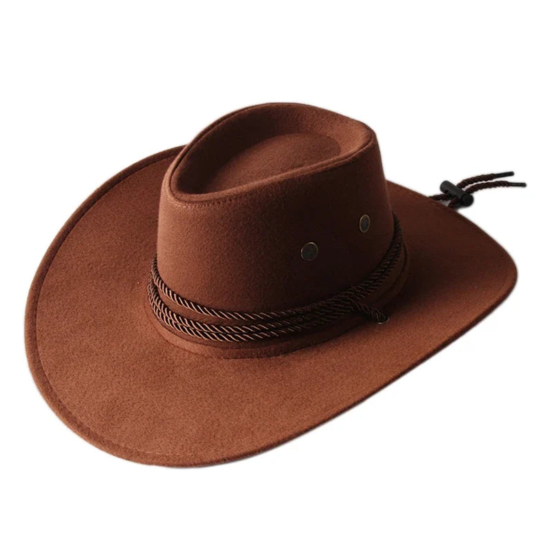 Chapeau cowboy posé sur une botte en cuir