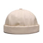 Bonnet gris foncé, boucle de réglage visible