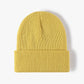 Bonnet posé à plat, montrant sa couleur unie et sobre