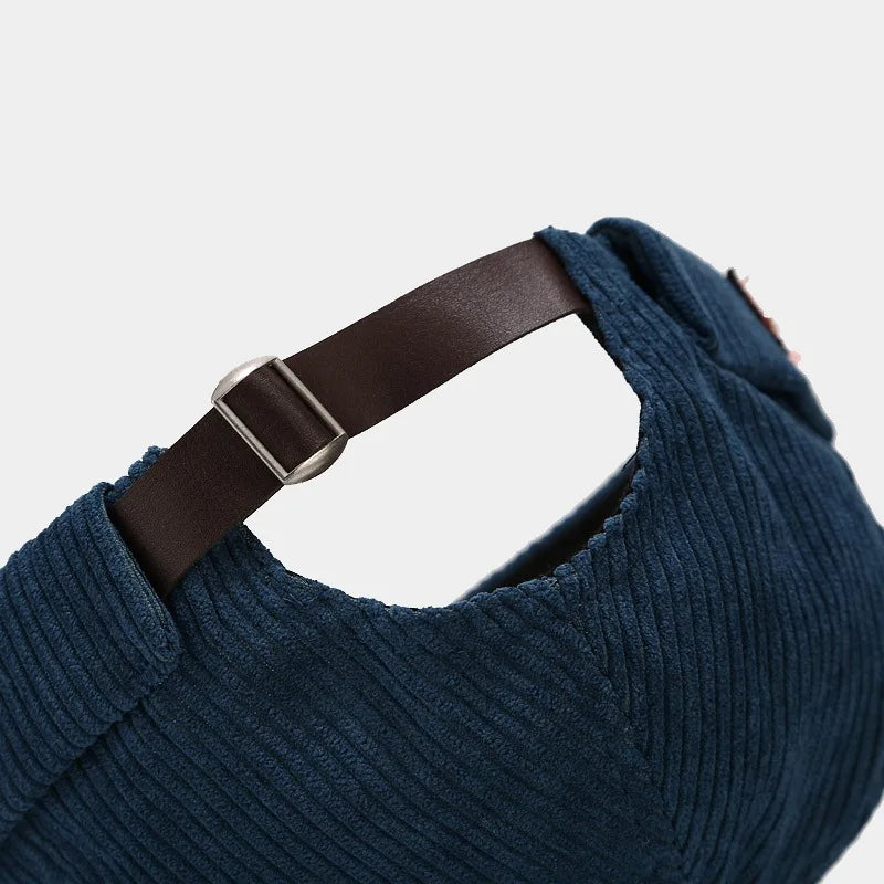 Détail de la couture et texture du velours côtelé