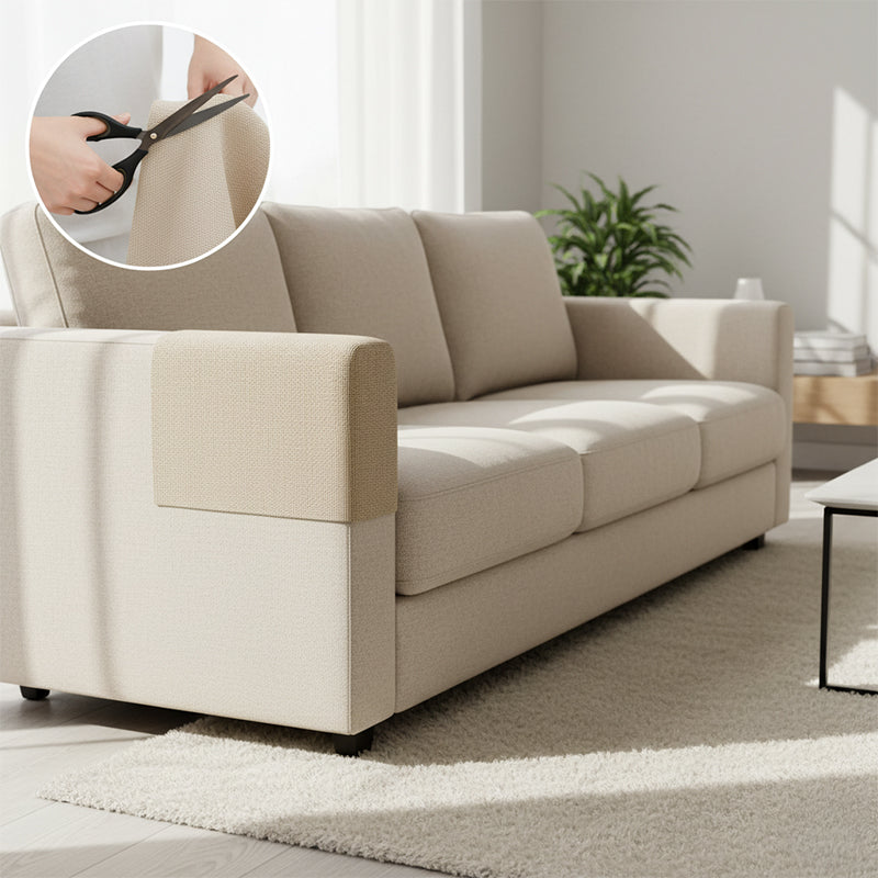 Tapis anti-griffes adhésif sur un canapé en tissu gris