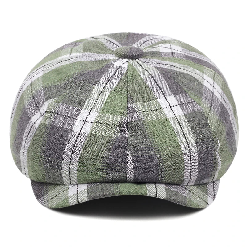 Gros plan sur une casquette gavroche en coton à motifs carreaux