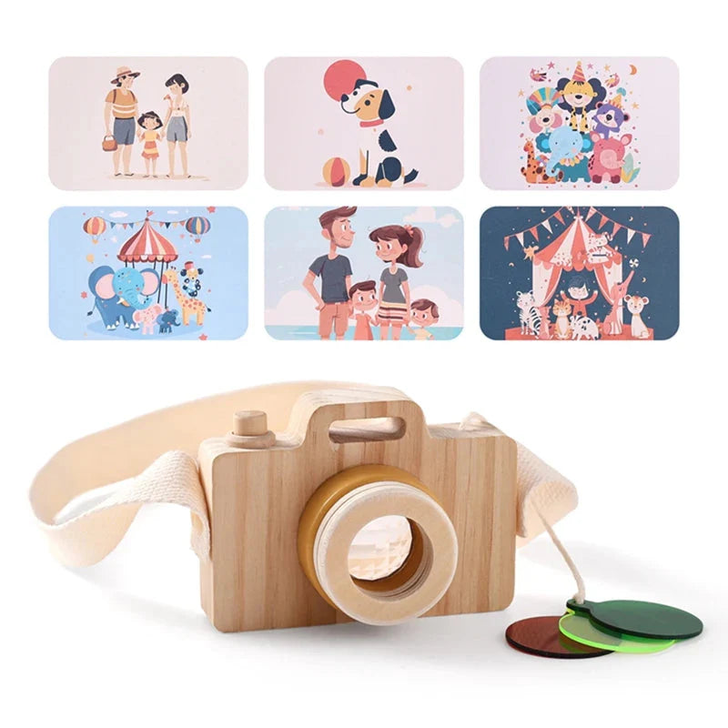 Enfant jouant avec l'appareil photo en bois à l'extérieur