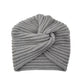 Vue latérale du bonnet turban, mettant en valeur le nœud