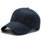 Casquette à carreaux sur fond blanc, vue de profil