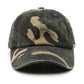 Gros plan sur le motif camouflage de la casquette
