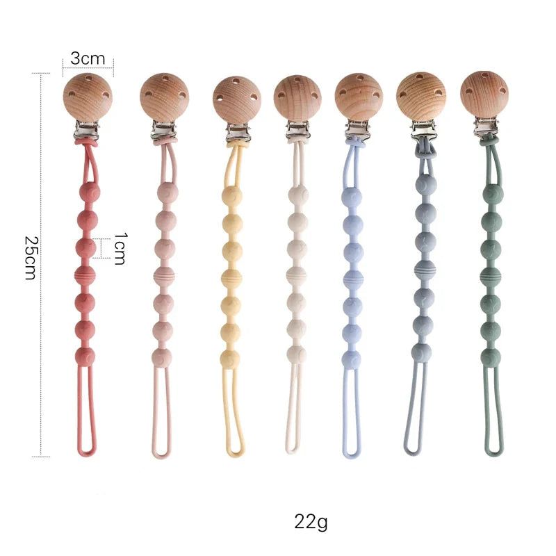 Attache sucette avec clip en bois et perles pastel