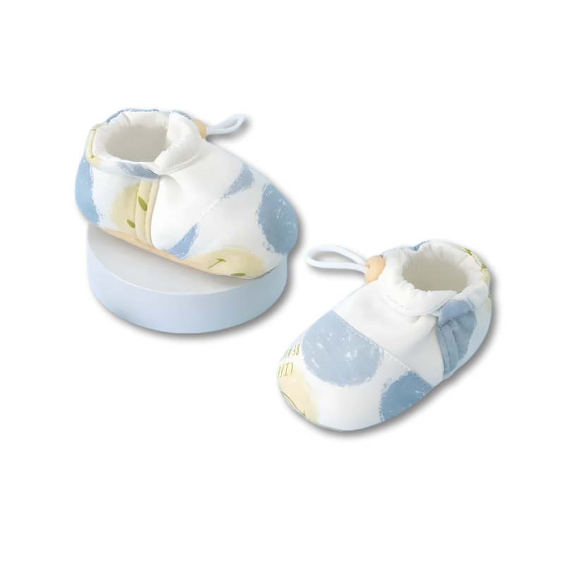 Bottines bébé avec motif sourire, semelles sécurisées