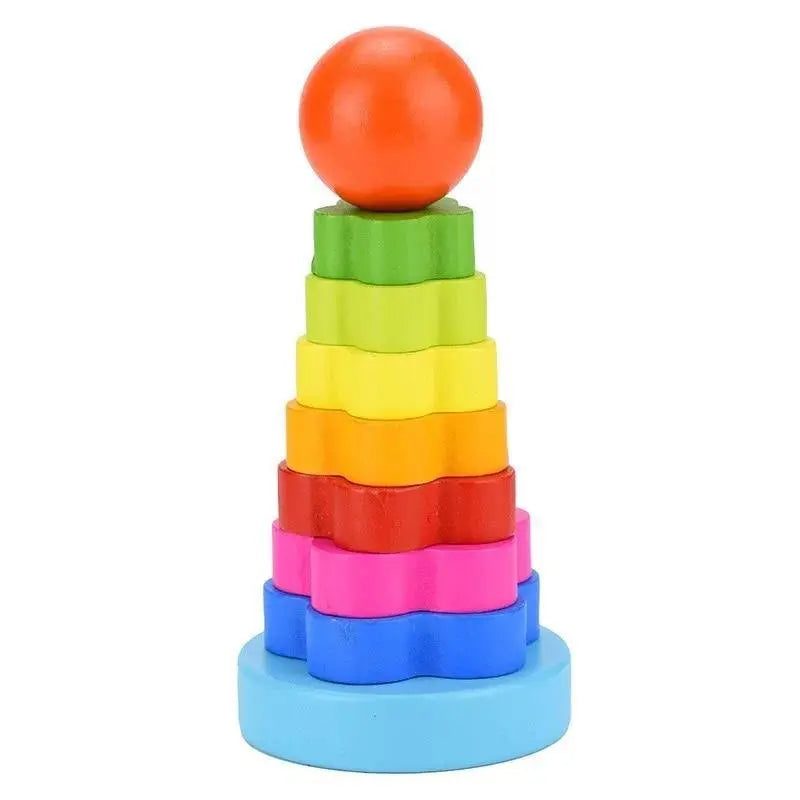Enfant jouant avec des pièces en bois de différentes couleurs