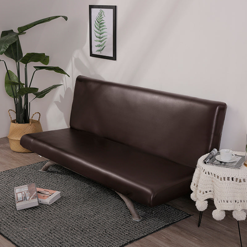 Housse de clic clac en similicuir beige sur canapé-lit
