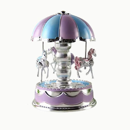 Veilleuse musicale bleu et mauve posée sur une table