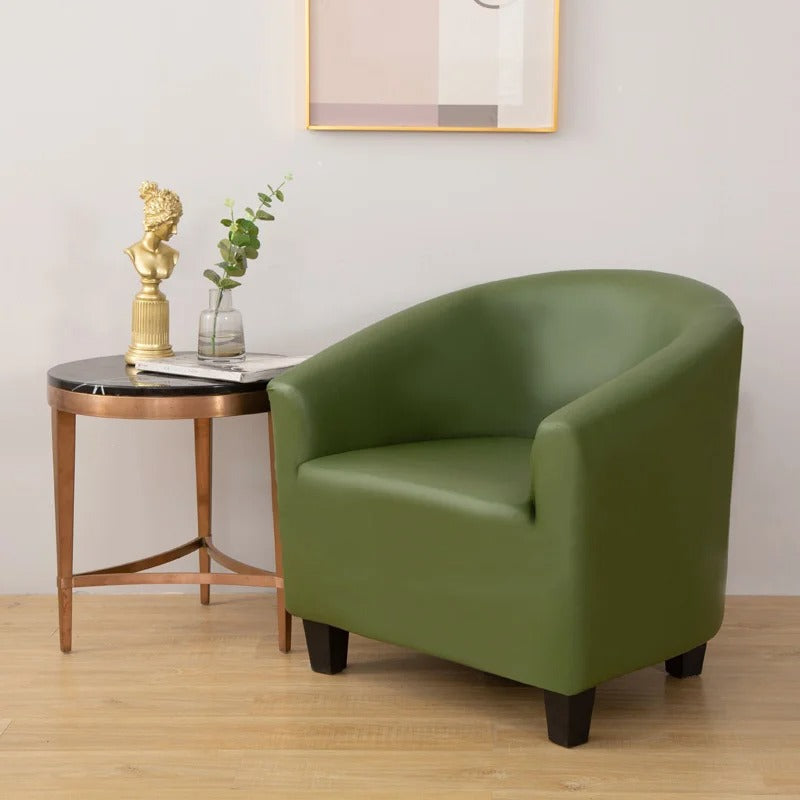 Housse verte en simili cuir sur fauteuil cabriolet