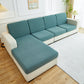 Housse déperlante verte sur coussin de canapé, vue de face