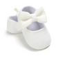 Chaussures bébé blanches avec nœud élégant