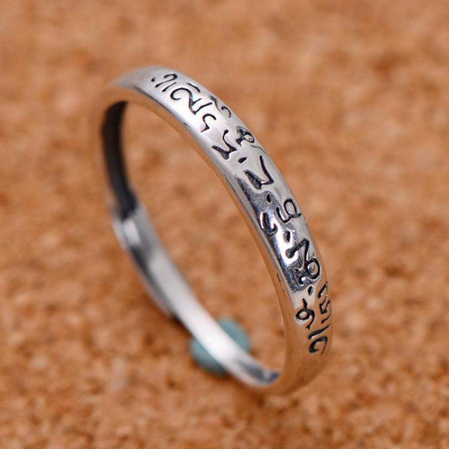Bague bouddhiste en argent, vue de côté