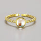 Bague ouverte en argent avec pierre de lune sertie