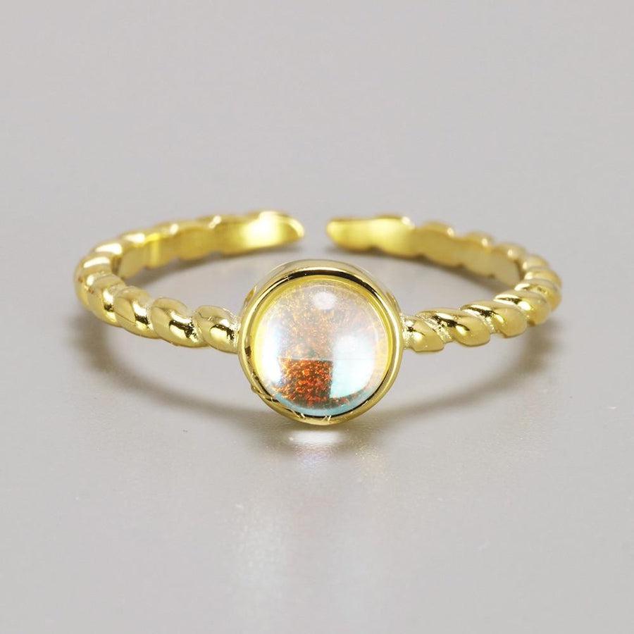 Bague ouverte en argent avec pierre de lune sertie
