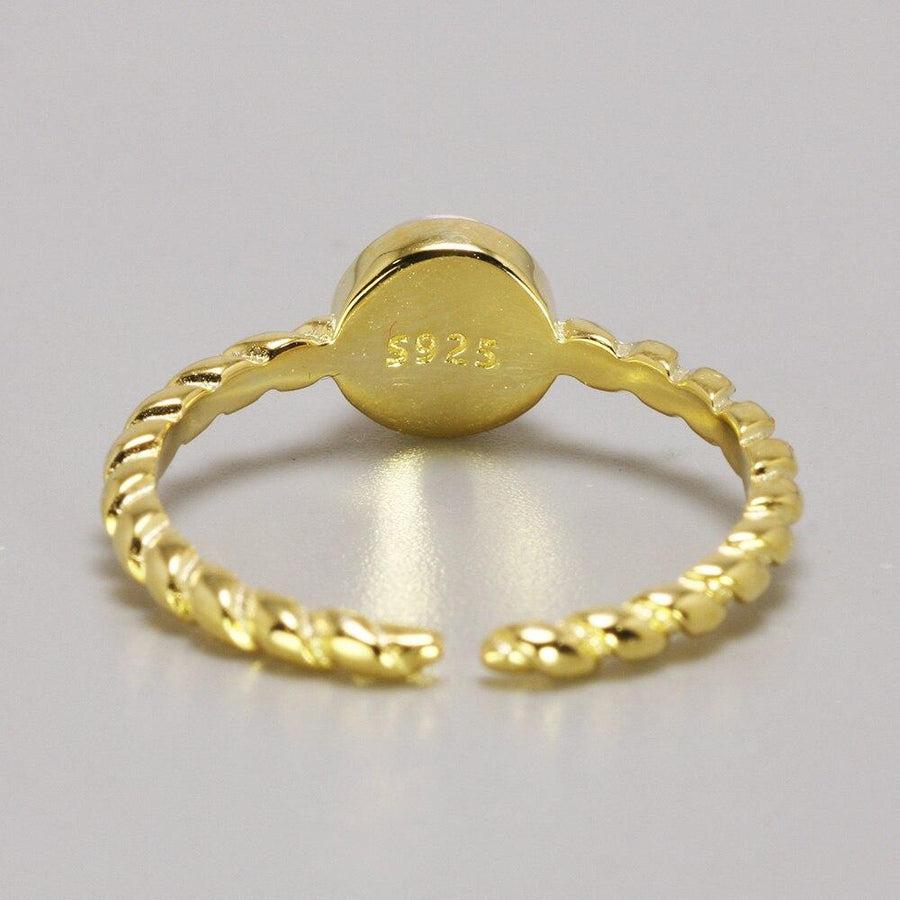 Bague réglable en argent avec reflets laiteux