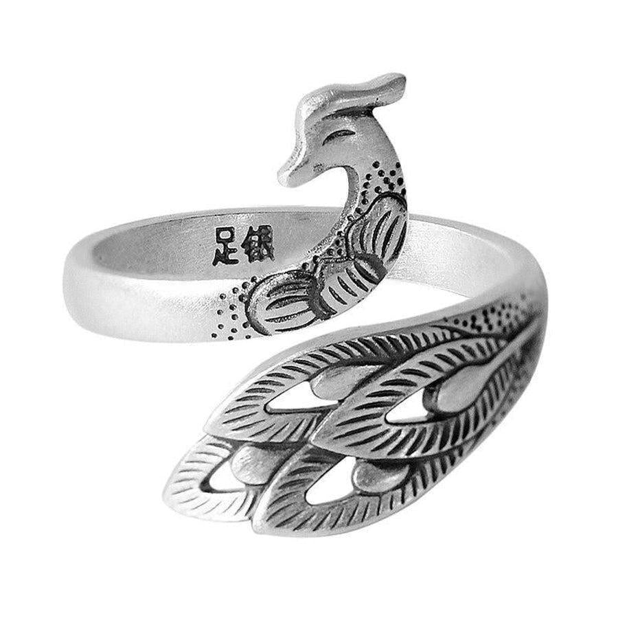 Bague en argent avec motif phénix détaillé vue de côté