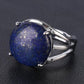 Bague avec cabochon en pierre bleue et monture argentée