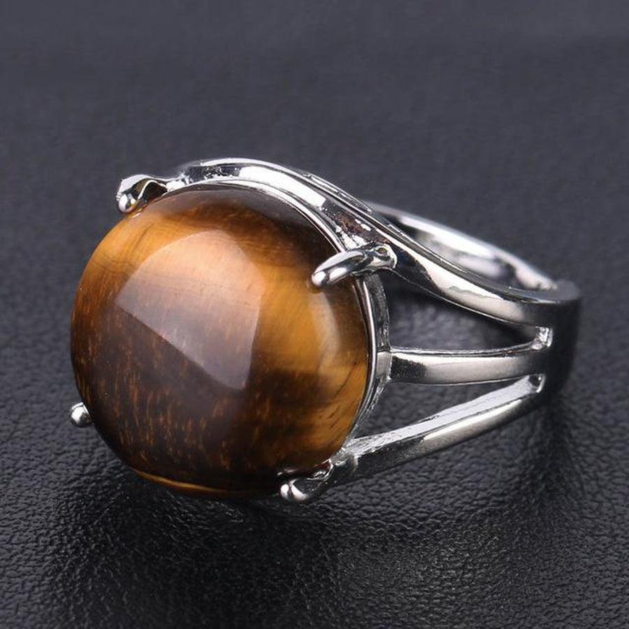 Bague avec cabochon en pierre rose et monture argentée