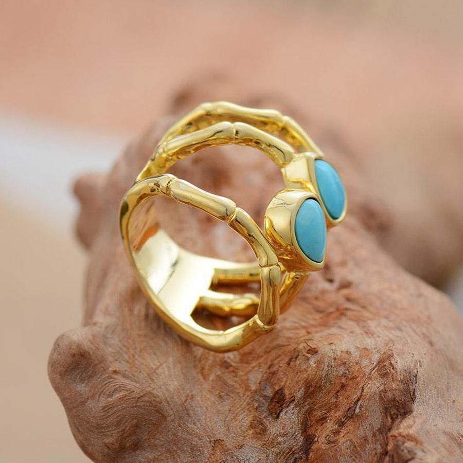 Bague effet trois anneaux, pierres turquoise serties