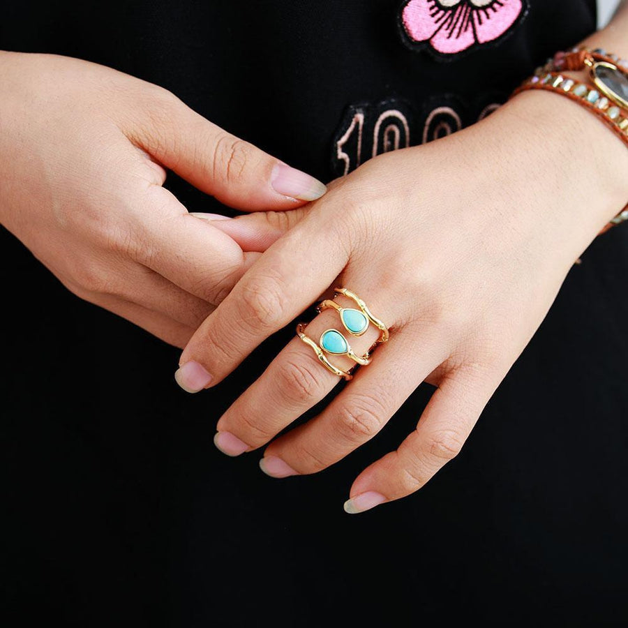 Bague avec pierres turquoise, vue de côté