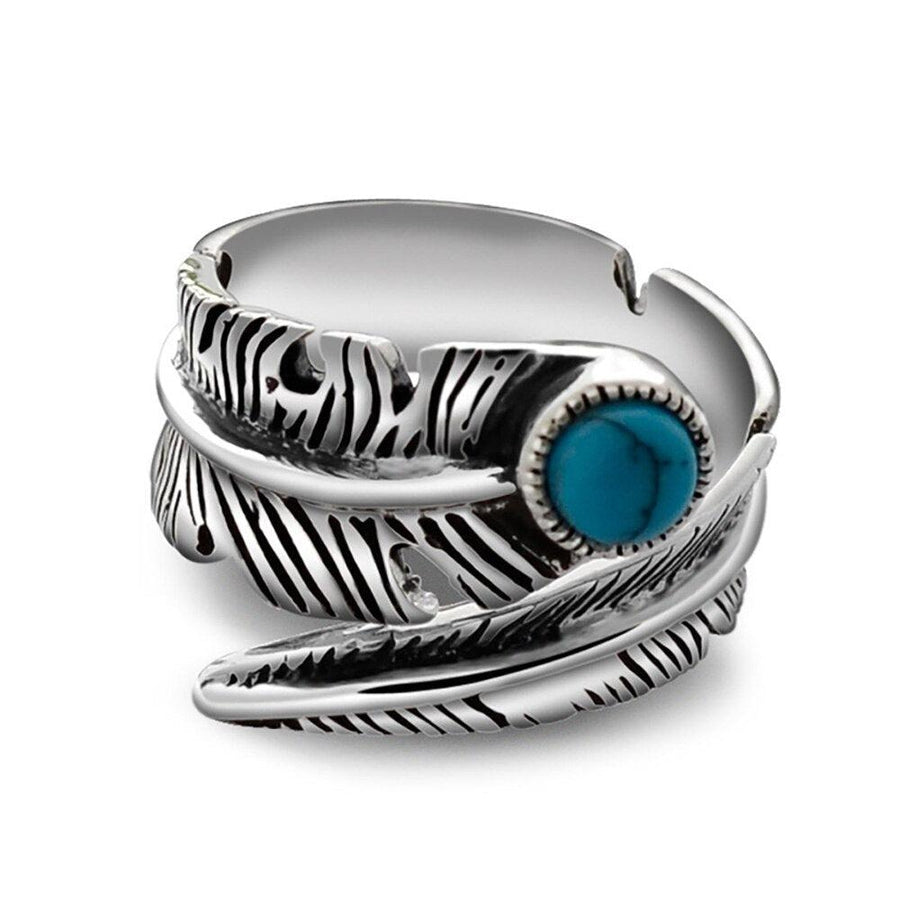 Bague en argent avec turquoise et motif plume ciselée