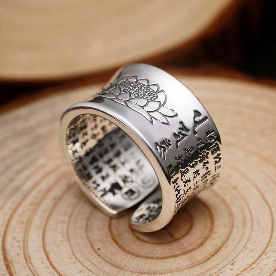 Bague ouverte en argent avec motifs symboliques