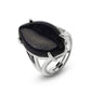 Gros plan sur une bague avec pierre turquoise ovale