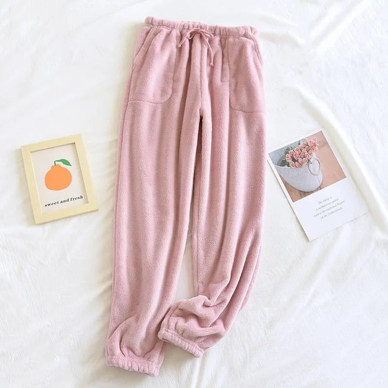 Bas de pyjama rose en pilou avec poches visibles