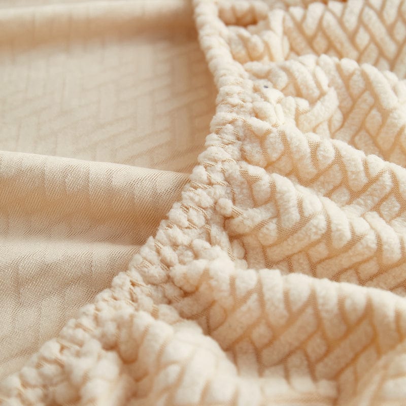 Housse polaire beige installée sur un coussin, vue de face