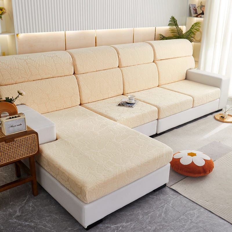 Détail du motif palmier sur housse polaire beige pour canapé