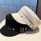 Casquette gavroche étoilée avec détails dorés