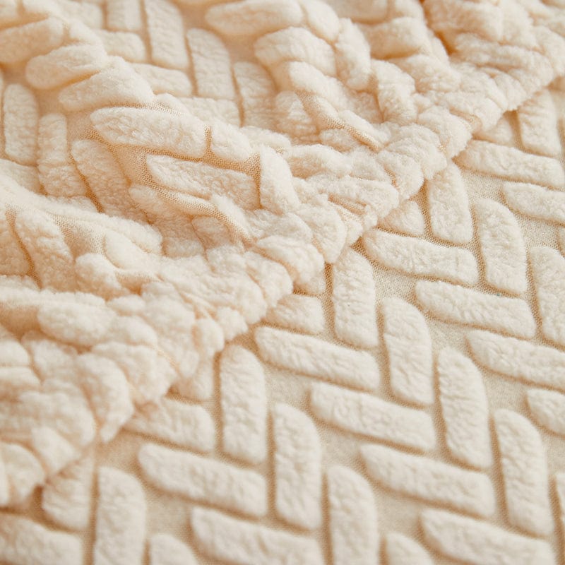 Zoom sur le motif en laine de la housse polaire