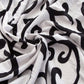 Housse de coussin avec motif géométrique en noir et blanc