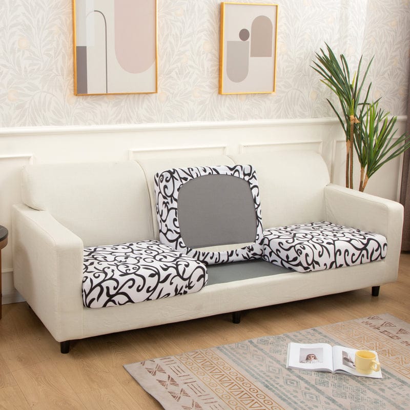 Housse de coussin extensible noir et blanc sur canapé