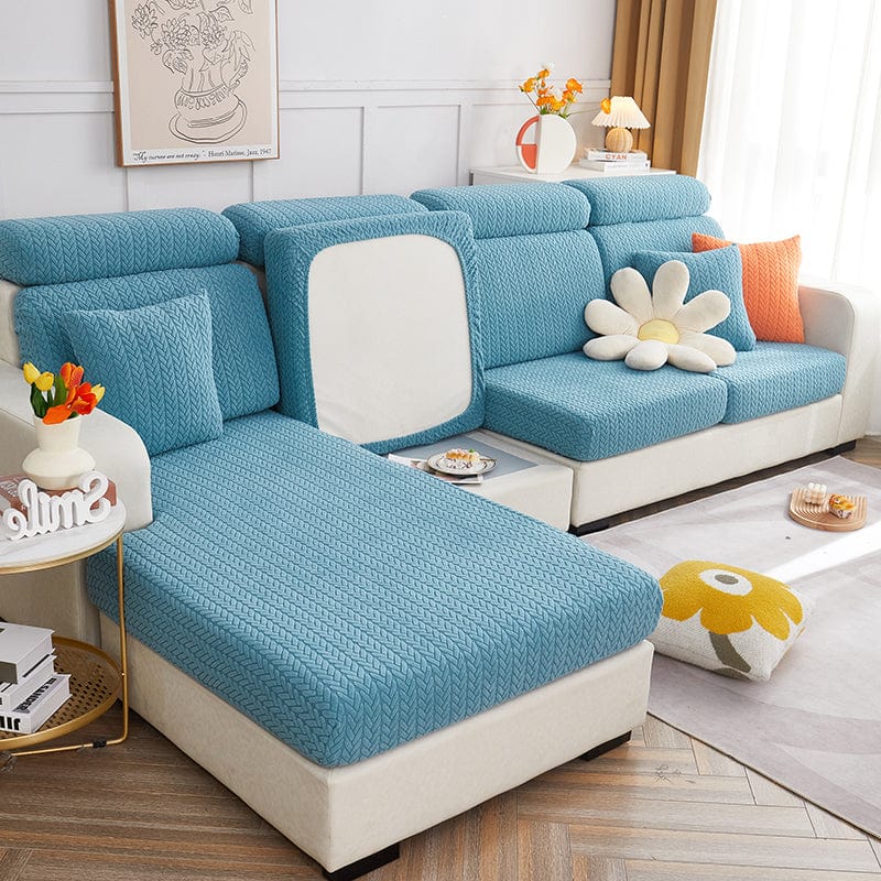 Housse polaire bleue couvrant un coussin, motif détaillé